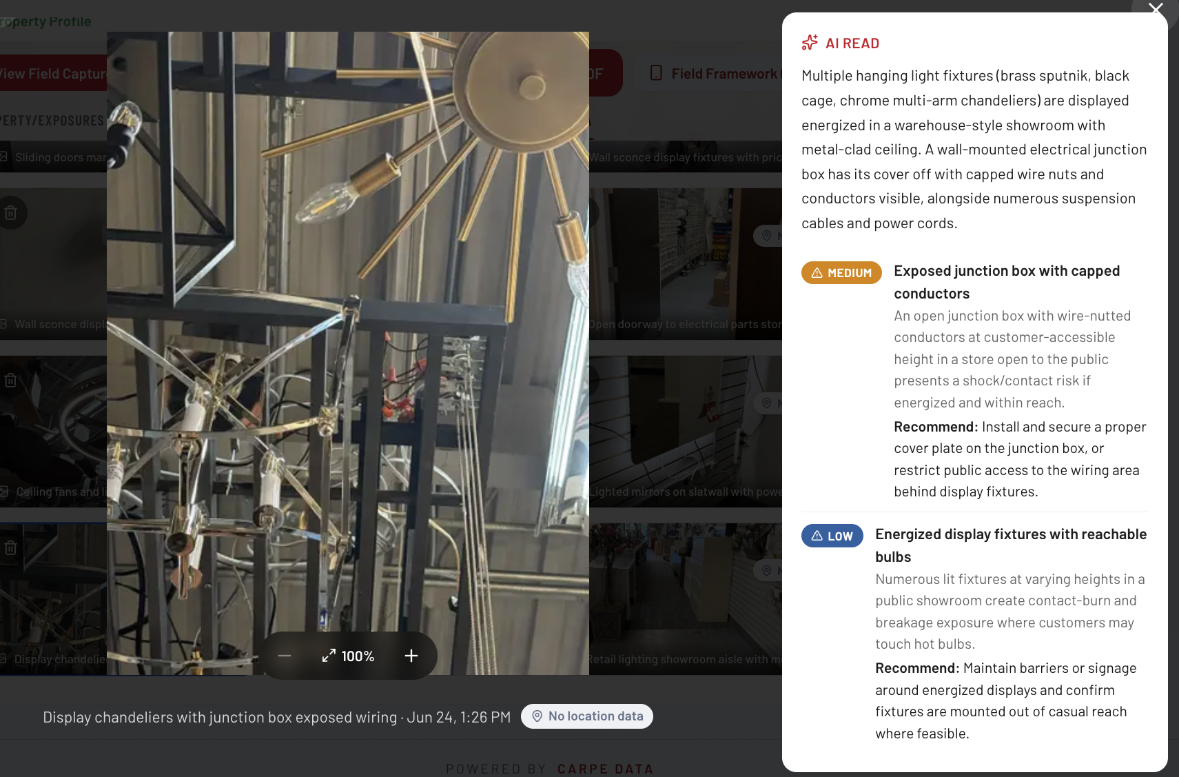 Carpe Loss Control AI Read media panel, showing a captured photo of display chandeliers with exposed junction-box wiring alongside an AI-drafted read that grades a Medium exposed junction box hazard and a Low energized display fixtures hazard, each with a recommendation